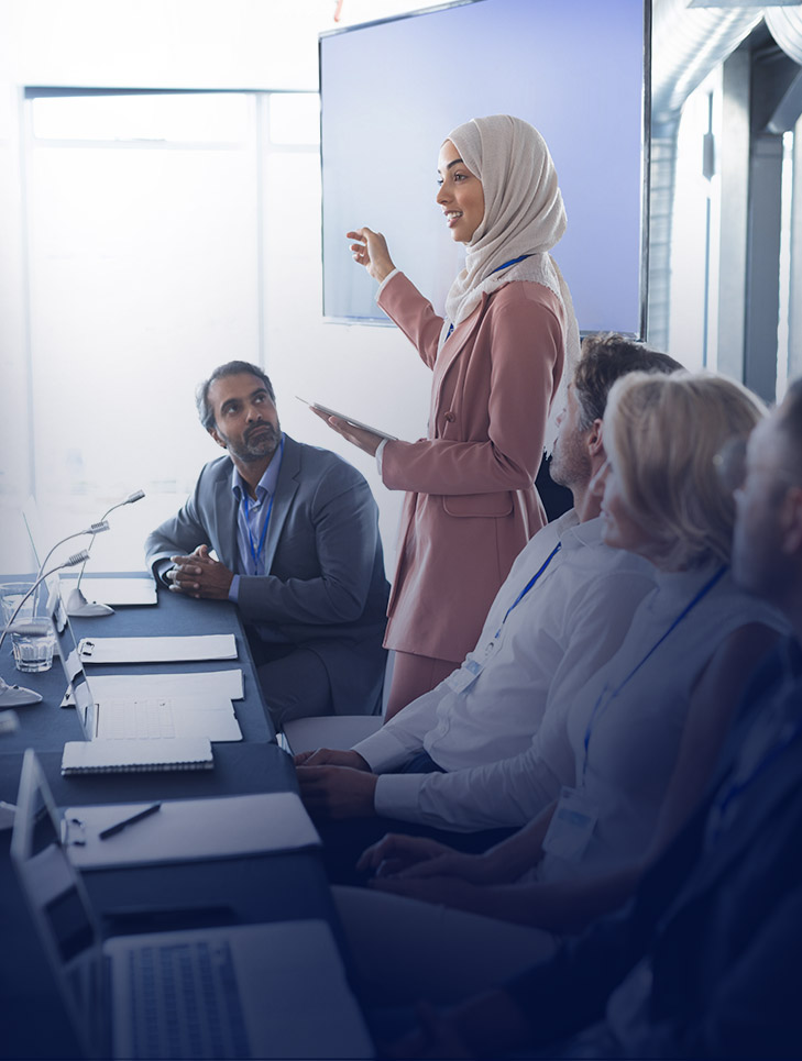 Professionals in a premium business meeting focused on trusted relationships